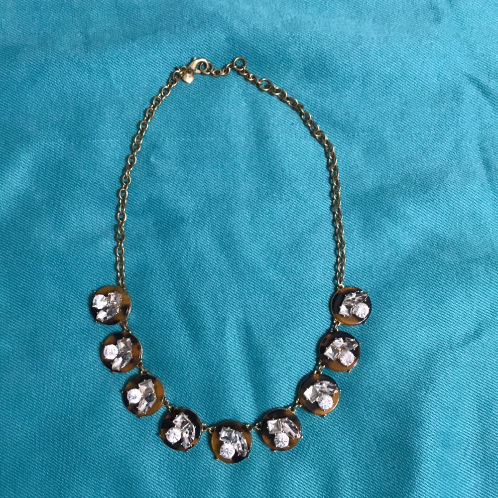 J Crew tortoise shell and crystal necklace with gold tone chain.